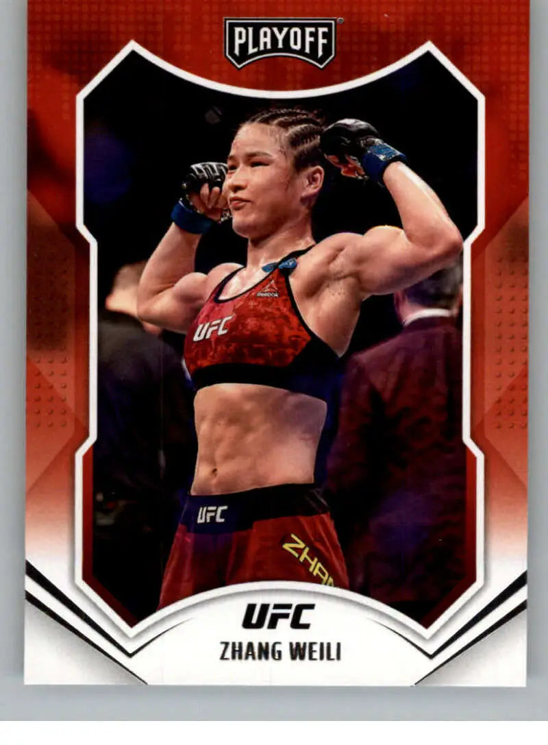 Zhang Weili in red sports bra poses during match on 2022 Panini Chronicles UFC card