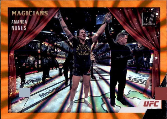 UFC fighter Amanda Nunes celebrating victory in the octagon, featured in Donruss UFC Magicians