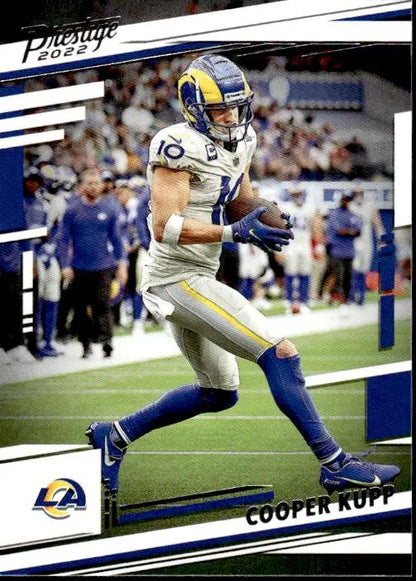 Cooper Kupp running with football in Los Angeles Rams blue and white uniform, 2022 Panini Prestige