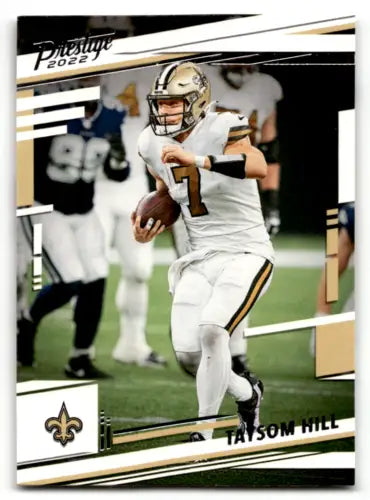 New Orleans Saints Taysom Hill in white uniform carrying ball, 2022 Panini Prestige card