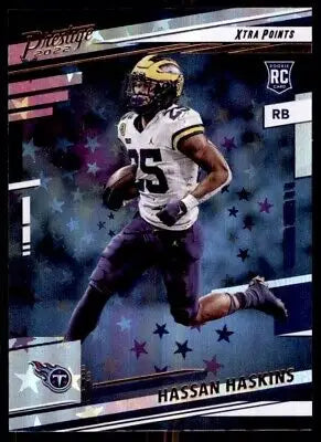 Football card of 2022 Panini Prestige Hassan Haskins Rookie Astral Parallel Titans