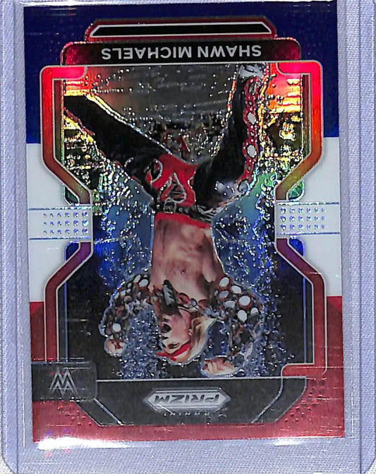 Red and blue holographic Panini Prizm WWE trading card of Shawn Michaels in motion