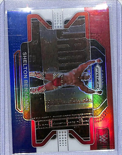 Holographic Panini WWE Prizm card of Shelton Benjamin in red uniform leaping