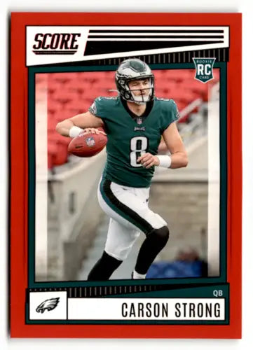 Football trading card of Carson Strong in green jersey, 2022 Score Red, Eagles rookie