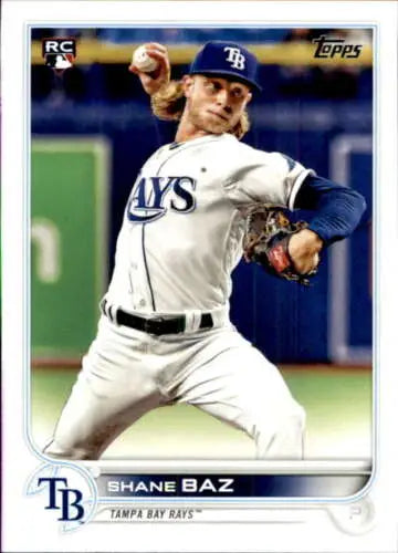 Baseball card of Shane Baz in mid-throw, wearing a white Rays uniform, original gloss