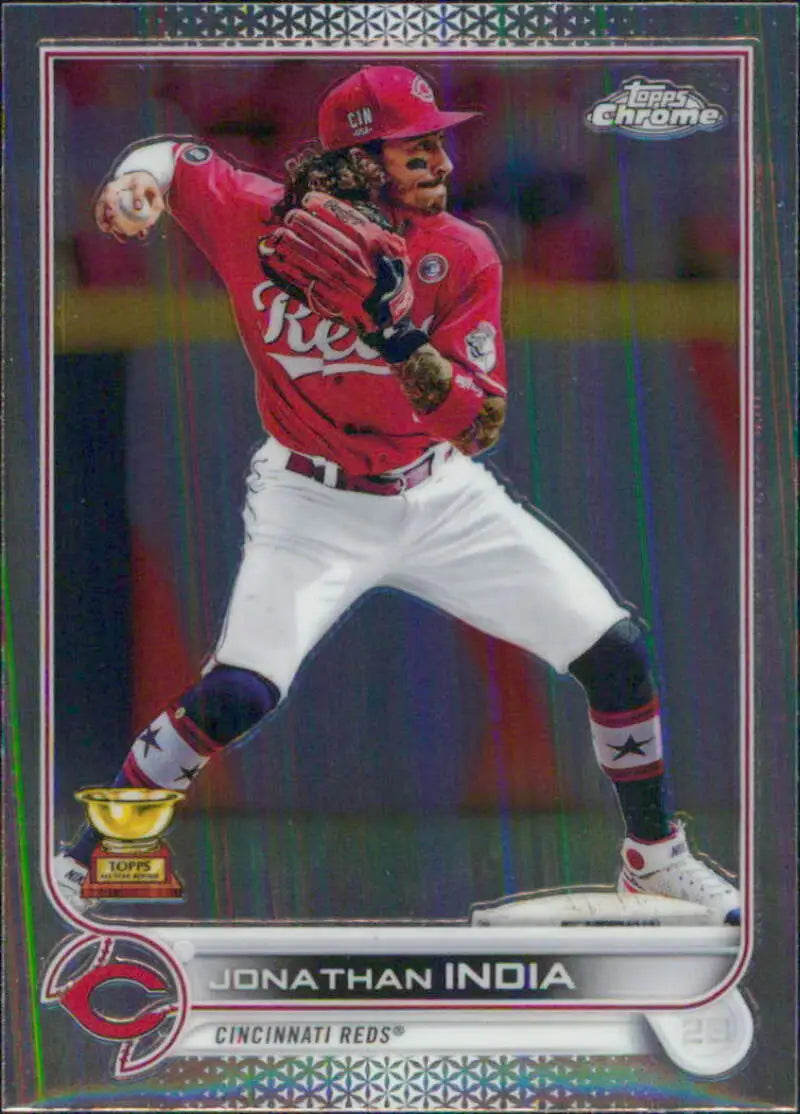 Chrome-finish baseball card of Jonathan India throwing in a red Cincinnati Reds jersey