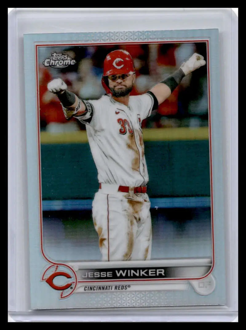 Topps Chrome Jesse Winker baseball card featuring Cincinnati Reds player in home uniform