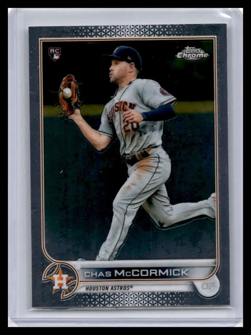 Houston Astros baseball card of Chas McCormick making a catch in Topps Chrome uniform