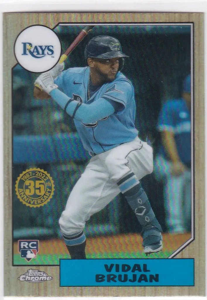 Baseball card of Vidal Brujan at bat in light blue jersey for Topps Chrome Anniversary Tampa Bay Rays