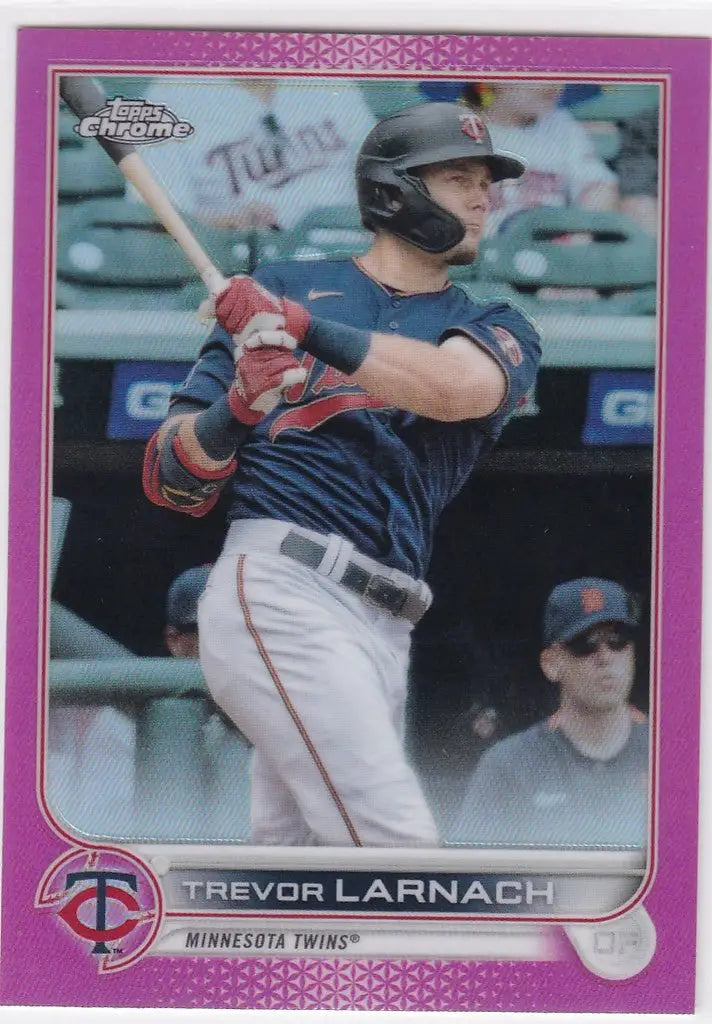 Baseball card of Trevor Larnach swinging bat, featuring Pink Minnesota Twins design