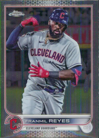 Franmil Reyes celebrating in gray road uniform on 2022 Topps Chrome Cleveland Guardians card