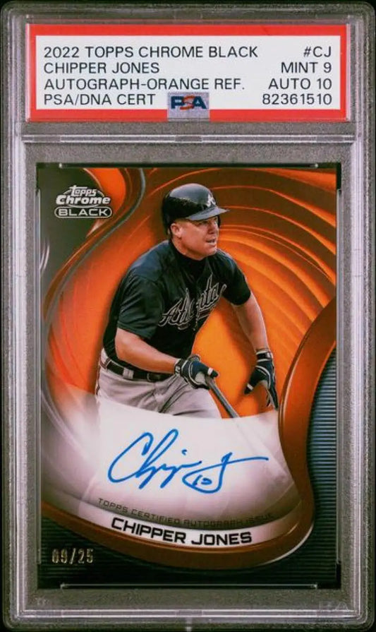 PSA-graded 2022 Topps Chrome Black Chipper Jones auto baseball card with orange design