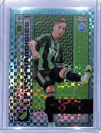 Holographic Topps Chrome MLS Soccer card of Zan Kolmanic in black and white stripes