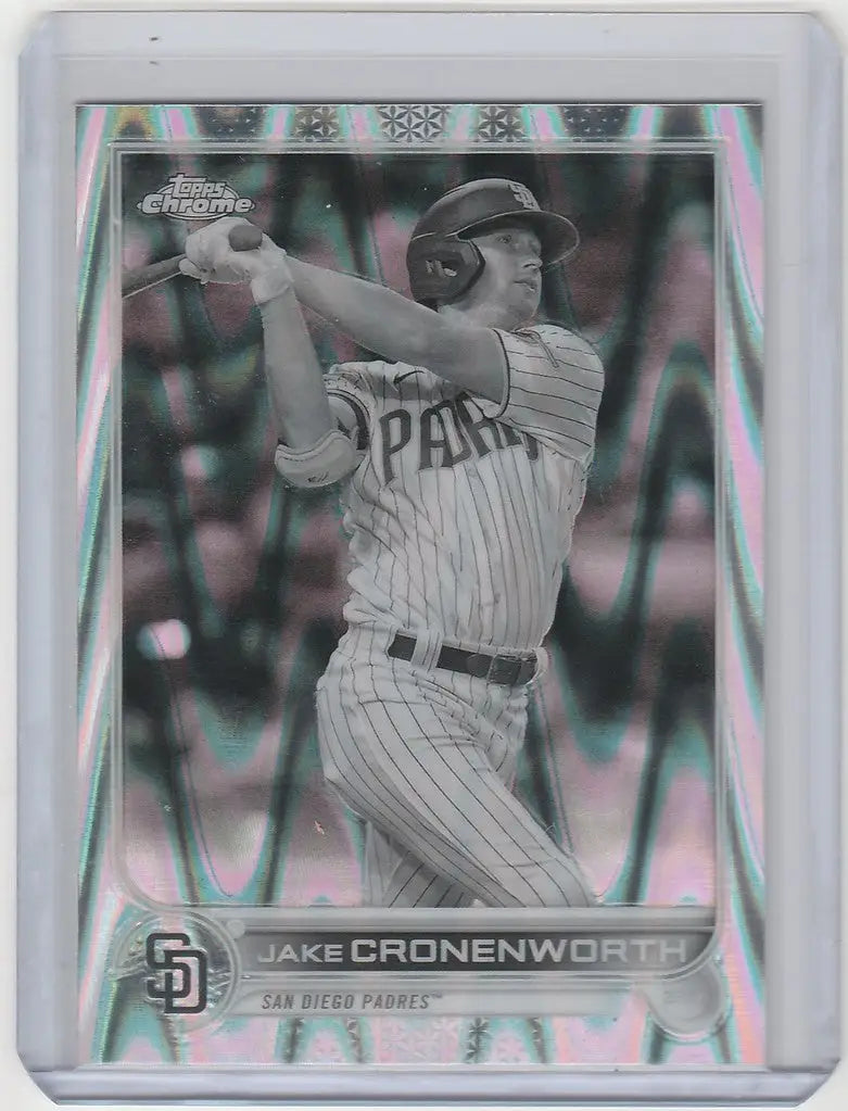 Baseball card of Jake Cronenworth mid-swing for San Diego Padres Topps Chrome Raywave