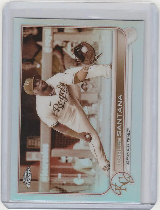 Baseball trading card of Carlos Santana mid-throw for Kansas City Royals Topps Chrome Sepia