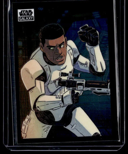 Stormtrooper in white armor with blaster rifle from Star Wars Galaxy card series