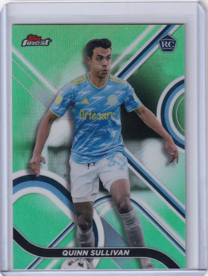 Green-tinted Topps Finest Lime trading card of Charlotte FC player in light blue jersey