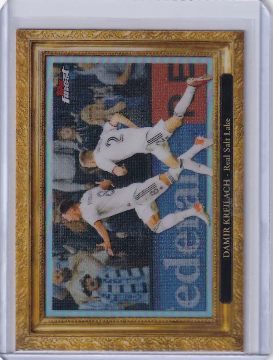 Baseball trading card in gold frame featuring Topps Finest Pitchuresque of Damir Kreilach