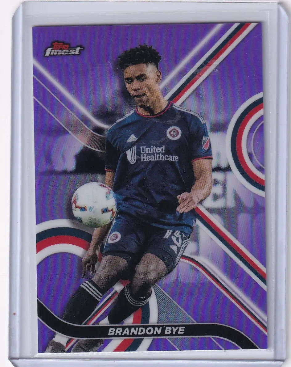 Soccer trading card of Brandon Bye in Topps Finest Purple uniform with a vibrant background