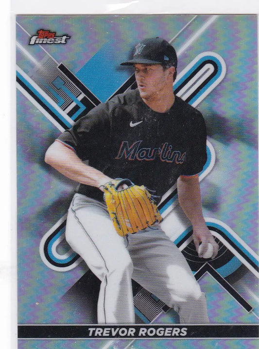 Baseball player in Miami Marlins jersey with yellow glove in Topps Finest Refractor