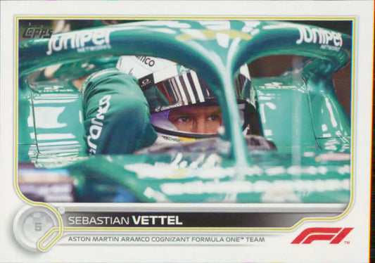 Sebastian Vettel in a green Aston Martin cockpit viewed through halo on Topps Formula 1 card