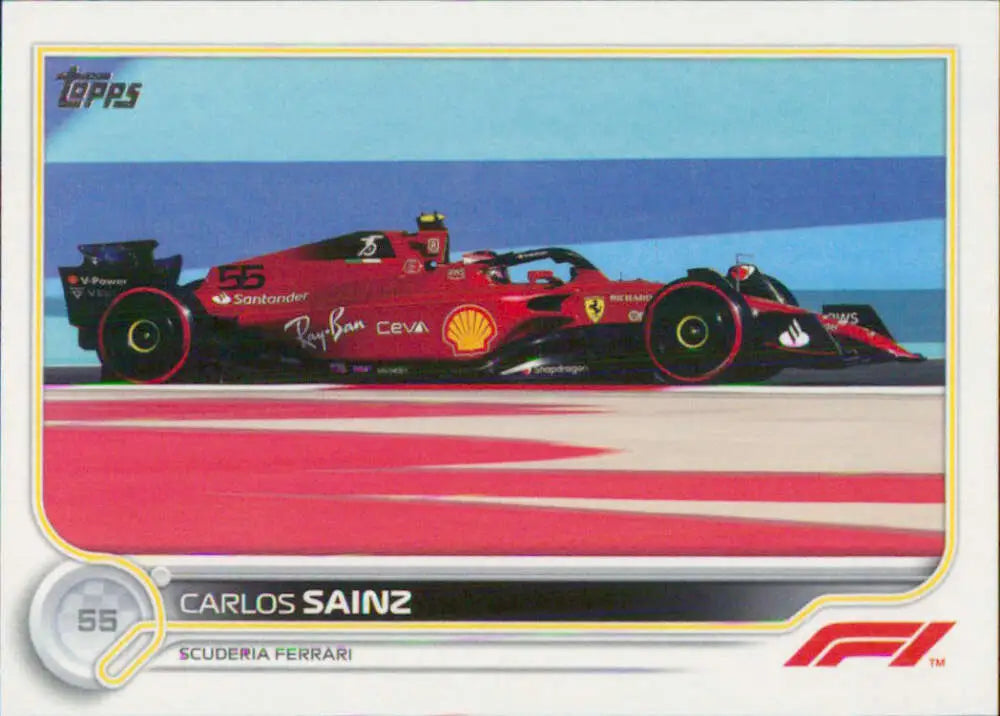 Red Ferrari Formula 1 car with Shell sponsorship featuring Carlos Sainz Topps Formula racing card