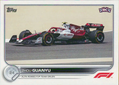 Formula 1 race car in white and red Alfa Romeo livery featuring Zhou Guanyu on track