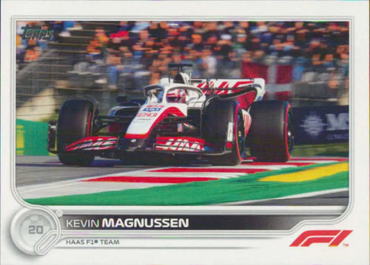 White and red Haas Formula 1 car on circuit for Kevin Magnussen Topps Formula racing card