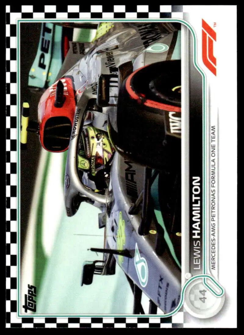 Formula 1 race car in black and silver livery featuring Lewis Hamilton in Topps Formula card