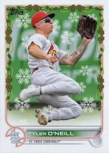 Baseball card featuring HW16 Tyler O’Neill in sliding catch with holiday border design