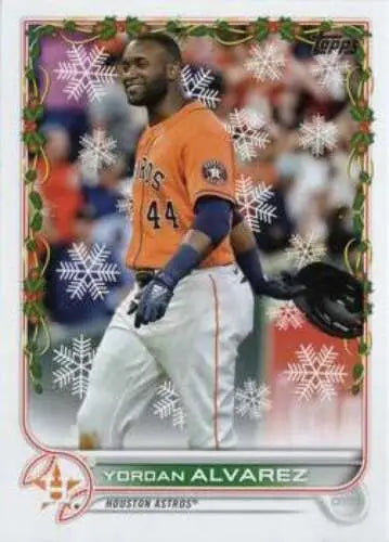 Baseball card of HW183 Yordan Alvarez in orange jersey with snowflake design, Topps Holiday