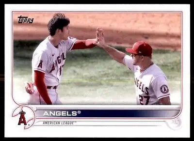 Baseball card of Los Angeles Angels players high-fiving in 2022 Topps #159