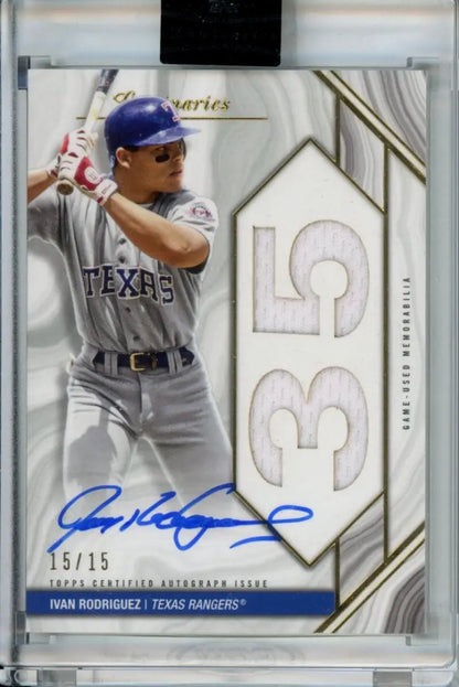 Baseball card of Ivan Rodriguez, Texas Rangers player, gray uniform, autographed 15/15