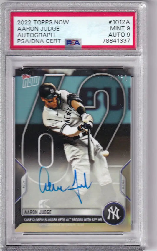 Graded baseball card of Aaron Judge swinging bat encased in holder, 2022 Topps Now Auto