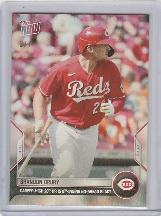 Brandon Drury Cincinnati Reds baseball card at bat in red uniform, Topps Now Rainbow Foil