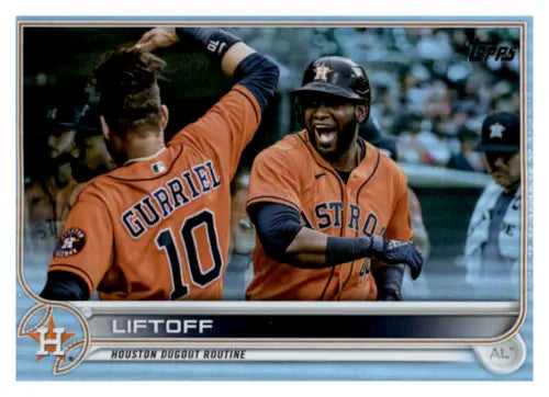 2022 Topps Rainbow Foil Yordan Alvarez card featuring Astros players in orange jerseys