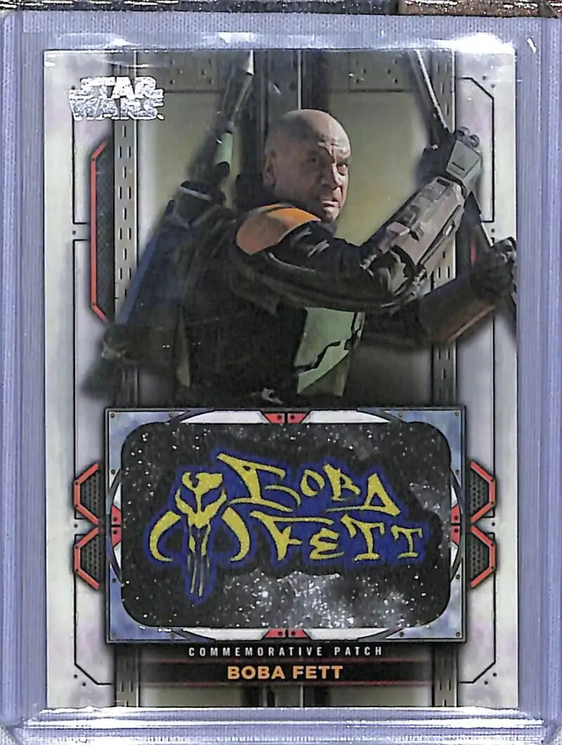 Boba Fett trading card featuring tactical gear and weapons, Star Wars commemorative patch