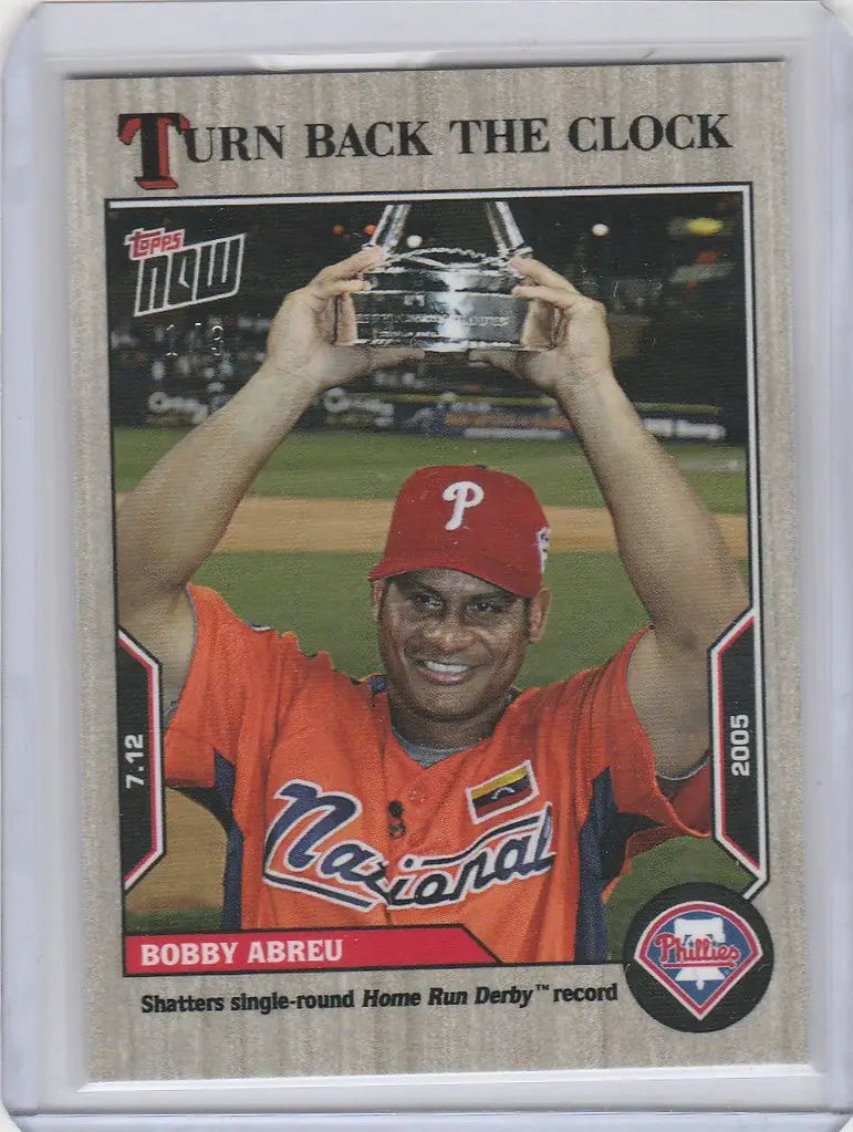 Baseball trading card of Bobby Abreu Phillies holding trophy, 2022 Topps Clock Ash Parallel