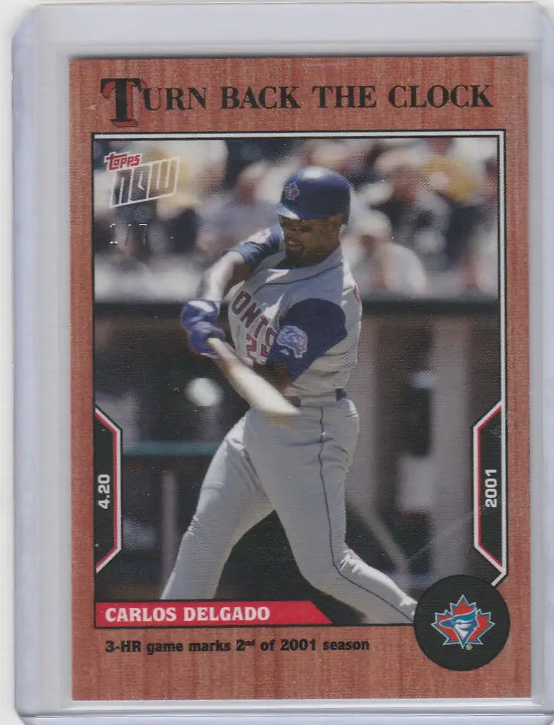 Baseball card of Carlos Delgado in a white uniform, 2022 Topps Clock Cherry Parallel