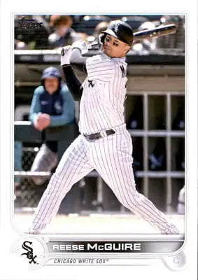 Baseball player Reese McGuire swinging bat in 2022 Topps Update White Sox card