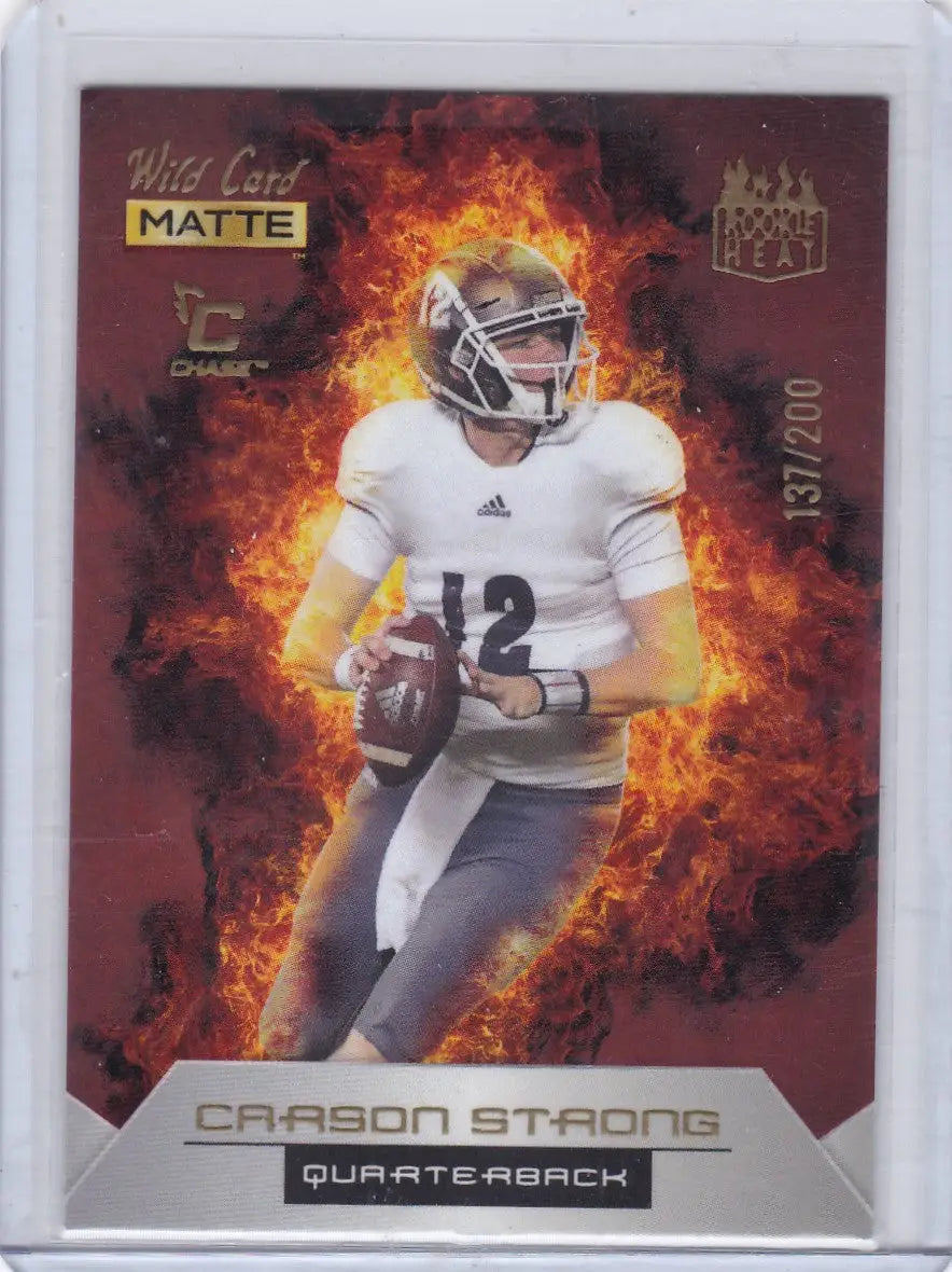 Football trading card of Carson Strong rookie in flames from Wild Card 2022 series