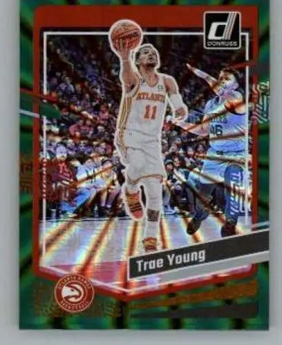 2023-24 Donruss Holo Green Laser Trae Young basketball card featuring original gloss