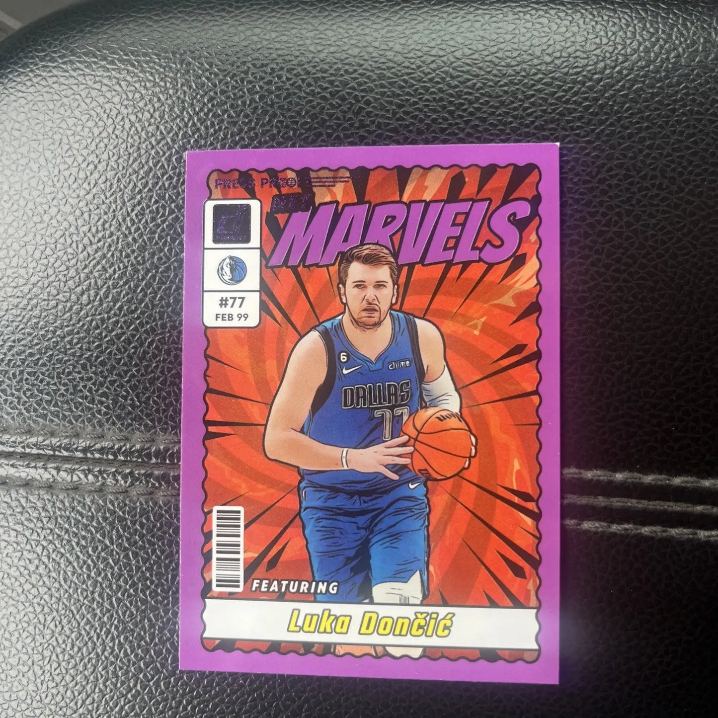 Luka Dončić 2023-24 Panini Donruss Net Marvels Purple Press Proof basketball card