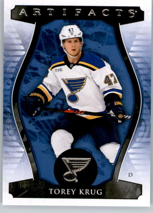 Hockey trading card of Torey Krug in a St. Louis Blues jersey from Upper Deck Artifacts