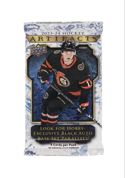 Sealed pack of 2023-24 NHL Artifacts hockey trading cards featuring base set rookies