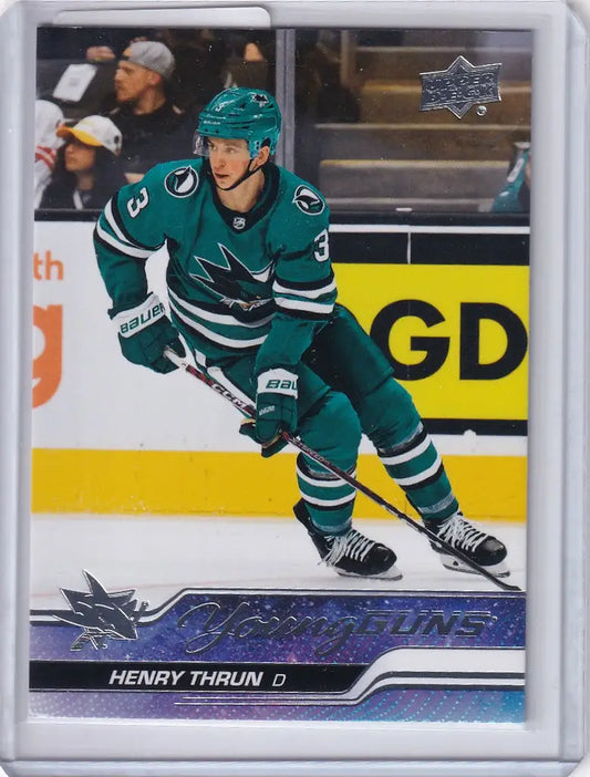 Hockey player in teal jersey skating on ice for San Jose Sharks Upper Deck Series card