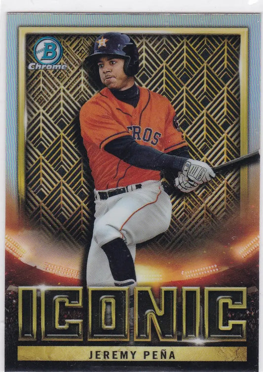 Baseball card of Jeremy Pena Iconic Houston Astros player swinging bat against gold background