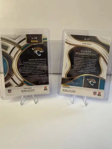 Two football trading cards featuring 2023 Jacksonville Jaguars dragon scale designs