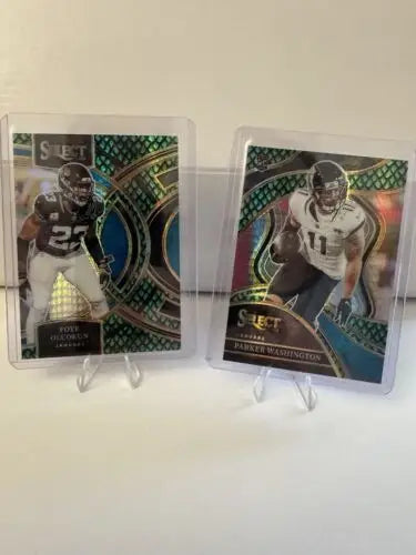 Two football trading cards featuring 2023 Jacksonville Jaguars Dragon Scale Prizm