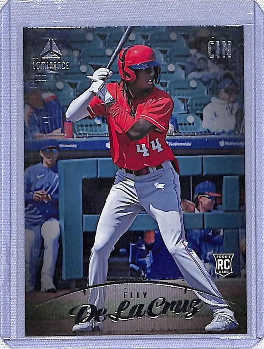 Baseball card of Elly De La Cruz in red jersey, featured in Panini Chronicles Luminance